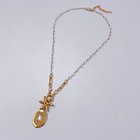 Necklace with Oval Pendant and Flower